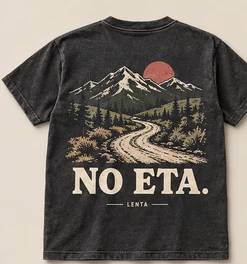No ETA tee: a dirt road winding toward mountains under a rust sun, on washed black.